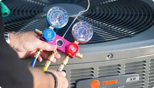 Technician repairing equipment